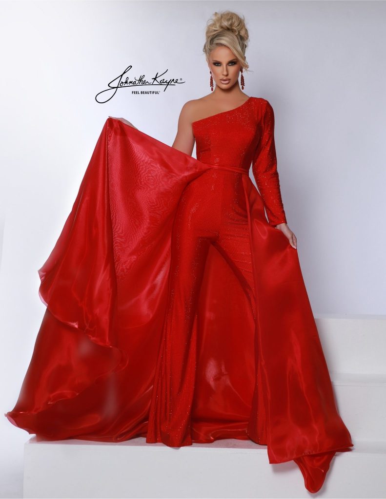 Johnathan Kayne 3103 jumpsuit, one-shoulder long sleeve jumpsuit, beaded formal jumpsuit, mirror organza overskirt jumpsuit, crystal sleeve jumpsuit, 4-way stretch Lycra jumpsuit, designer prom jumpsuits 2025, pageant jumpsuits, elegant formal jumpsuits, special occasion jumpsuits, where to buy Johnathan Kayne 3103, best beaded jumpsuits 2025, figure-flattering formal jumpsuit, red one-shoulder jumpsuit, red beaded formal jumpsuit, red jumpsuit with overskirt, red prom jumpsuit, red crystal sleeve jumpsuit